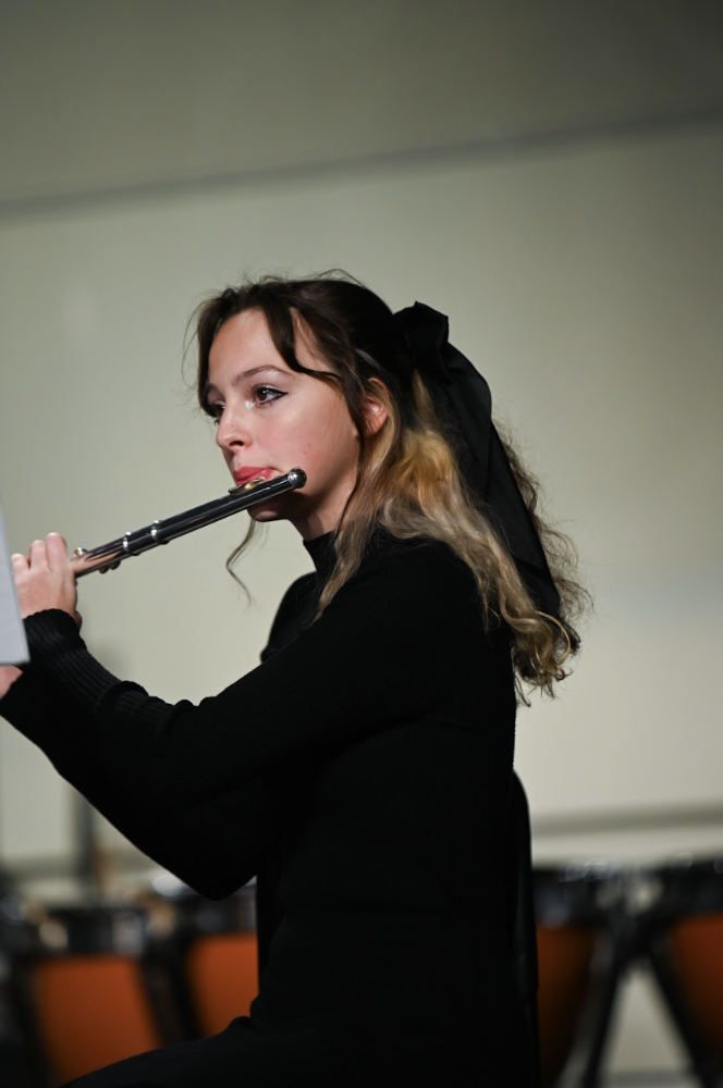 Taylor Short (10) joins the flute section to create the melody. 